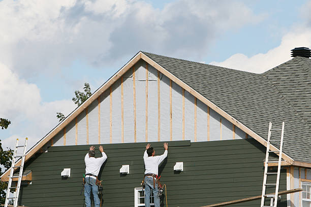 Professional Siding Installation technician working in Wyano, PA